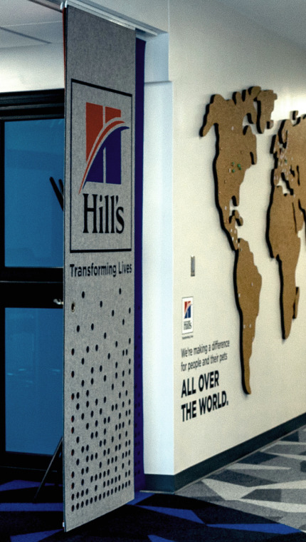 Hill's Pet Nutrition Centre office hallway with a world map on the wall